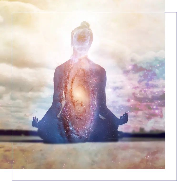 Meditating silhouette with galaxy inside body.